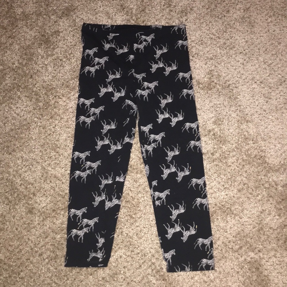 black cropped leggings with zebras